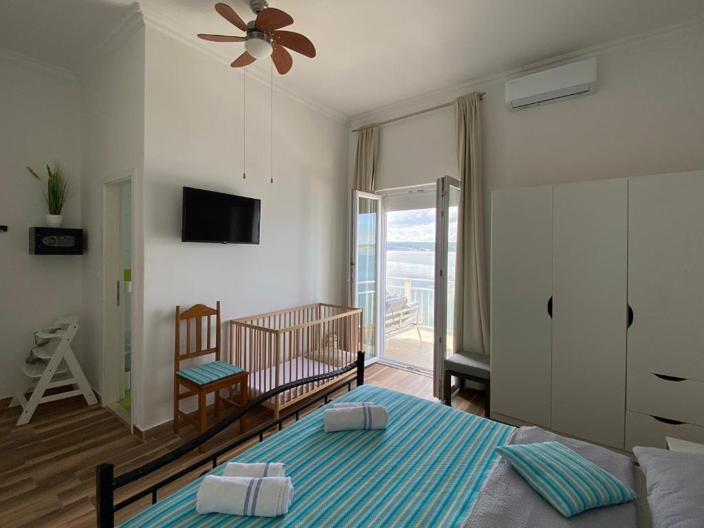 Posteľ alebo postele v izbe v ubytovaní Holiday Beach Apartment ,House Palmasol-1