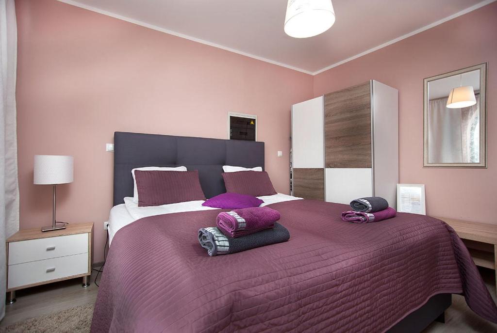 Postel nebo postele na pokoji v ubytování Rooms & Apartments Banjac