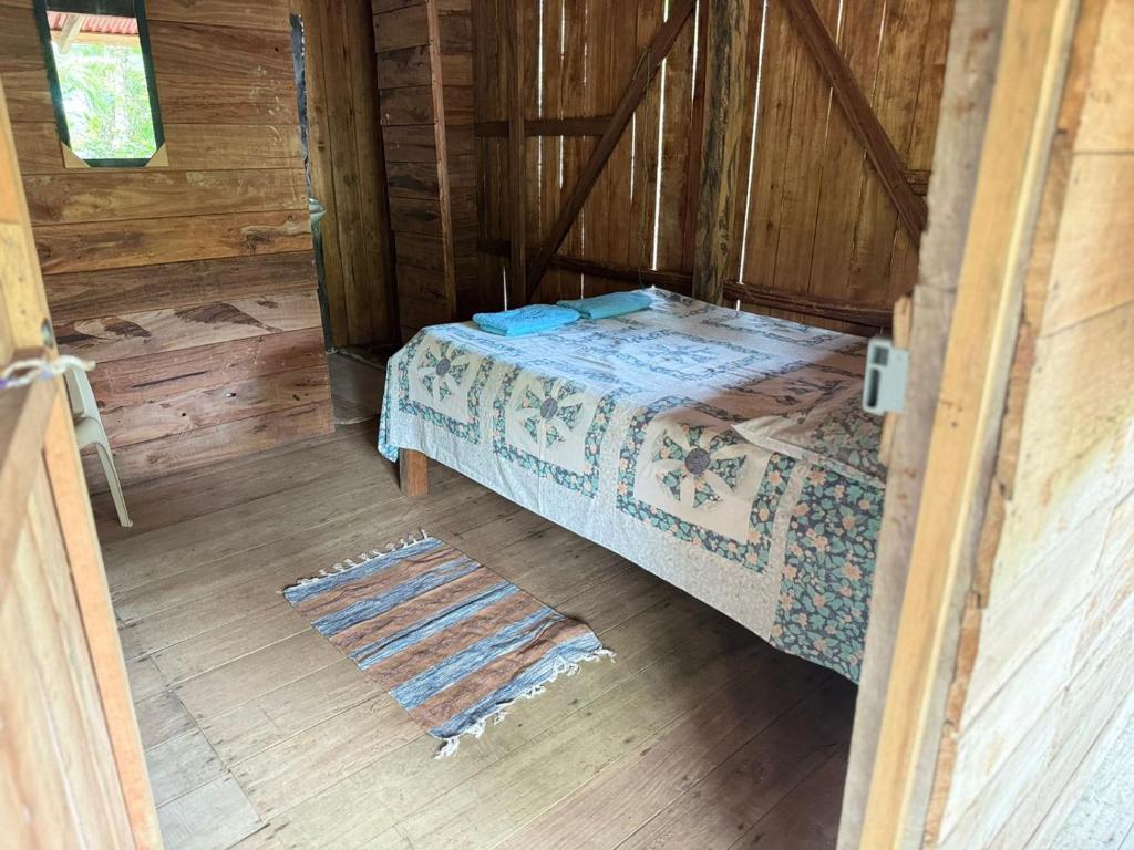 Postel nebo postele na pokoji v ubytování HOSPEDAJE DOÑA NEL