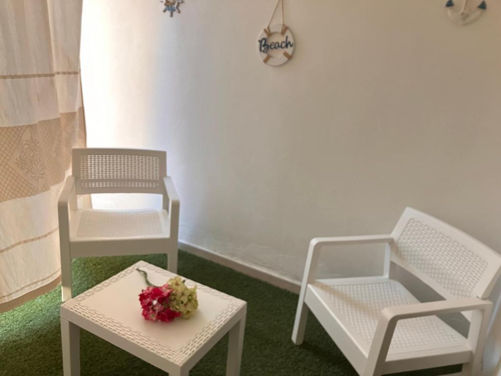 A seating area at Gadem Apartment