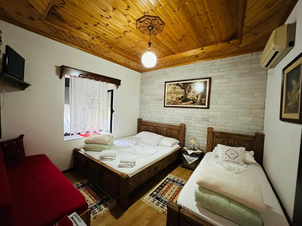 Postel nebo postele na pokoji v ubytování Kore Guest House