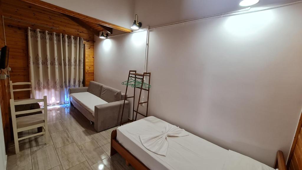 Postel nebo postele na pokoji v ubytování Villa Skenderi