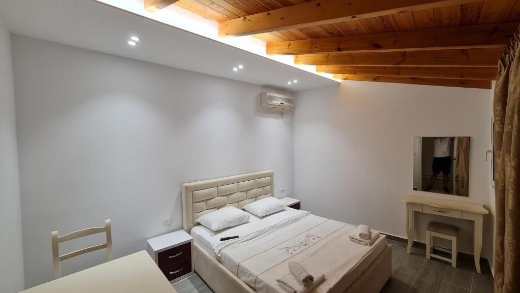 Postel nebo postele na pokoji v ubytování Villa Skenderi