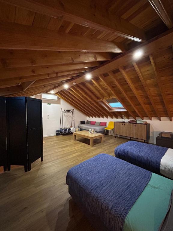 Postel nebo postele na pokoji v ubytování B&C Furnas House