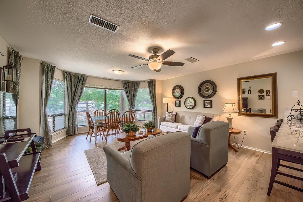 a living room with a couch and a table at CRC 317 Timeless Tranquility in New Braunfels