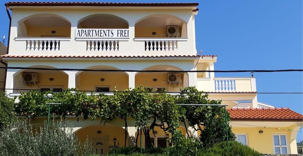 a building with a sign that reads hyannis reef at Apartments with WiFi Lopar, Rab - 14804 in Lopar