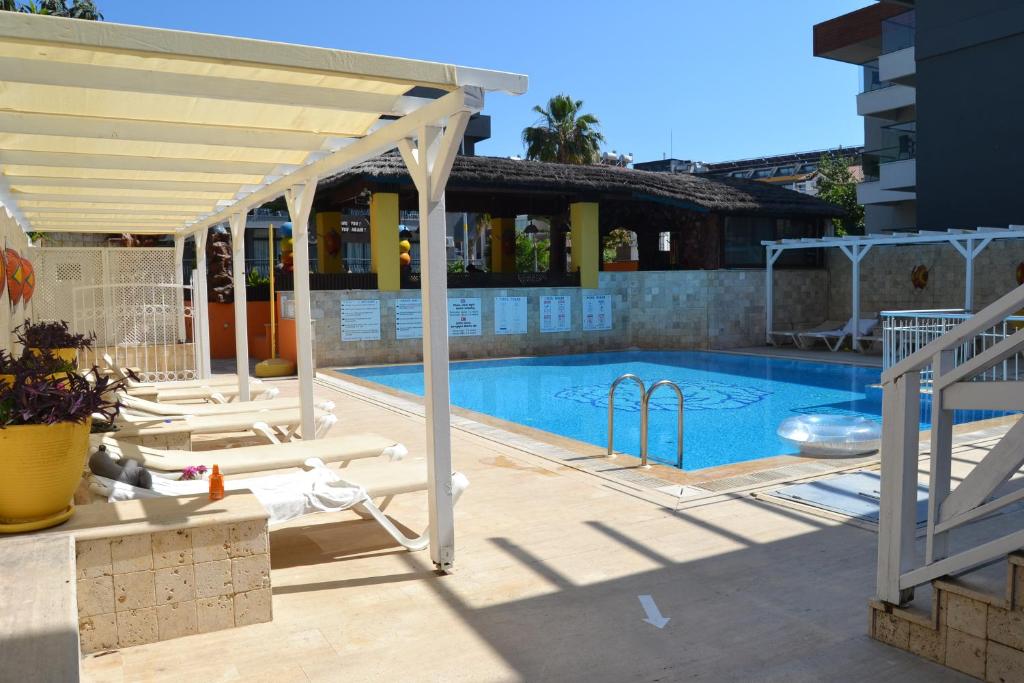 a pool with a pergola and a swimming pool at Noo 15 in Side