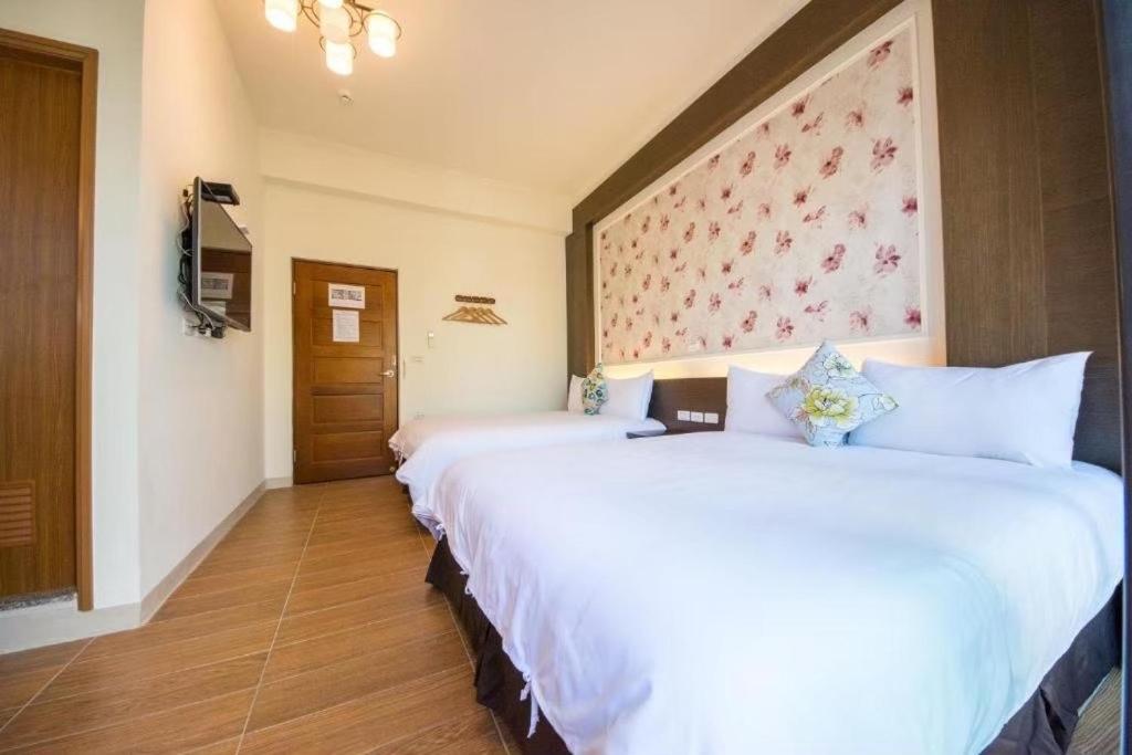 Postel nebo postele na pokoji v ubytování Sioufu B&B