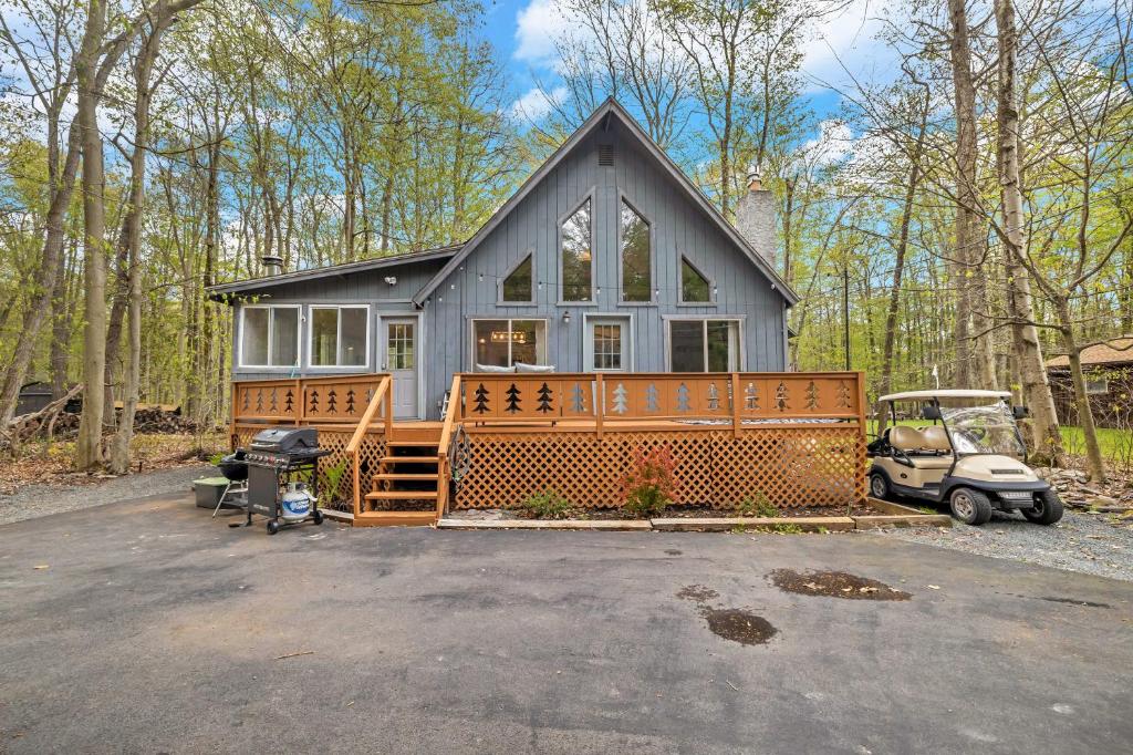 a house with a large deck in the yard at Close to Locust Lake:Beach:Fire Pit:Kalahari in Locust Lakes Village