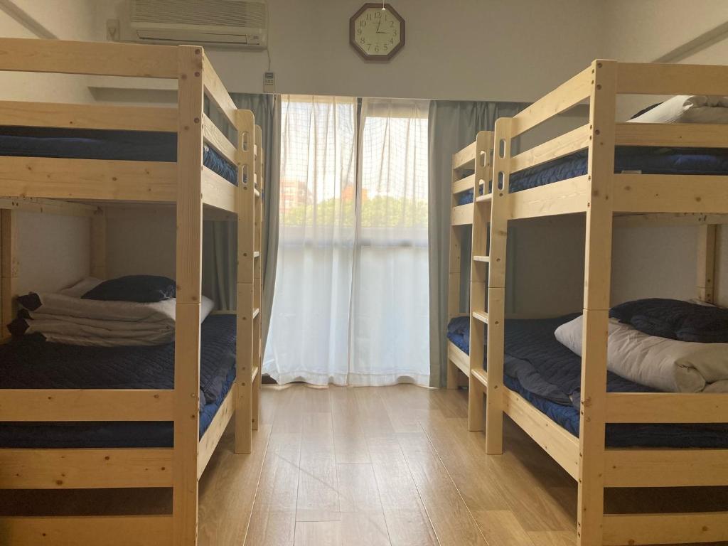מיטה או מיטות בחדר ב-JKhouse3