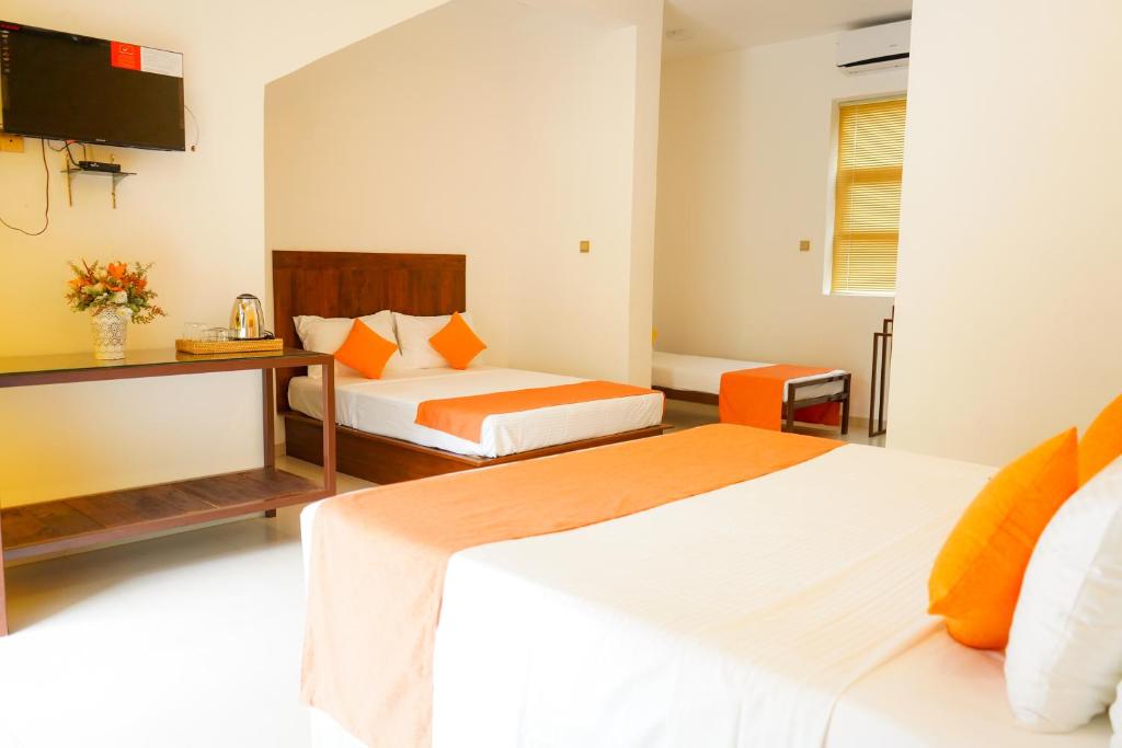 Postel nebo postele na pokoji v ubytování Ananthara Resort