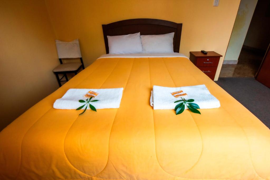 Ένα ή περισσότερα κρεβάτια σε δωμάτιο στο La Posada de Lucero