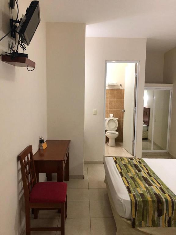 Postel nebo postele na pokoji v ubytování Hotel Xcalak