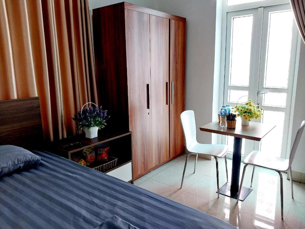 Postel nebo postele na pokoji v ubytování Nha Xanh Homestay