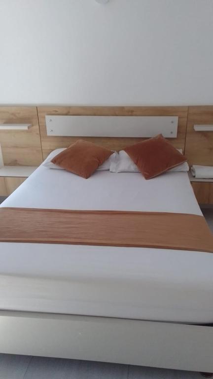 Postel nebo postele na pokoji v ubytování Hotel Gutier Rionegro