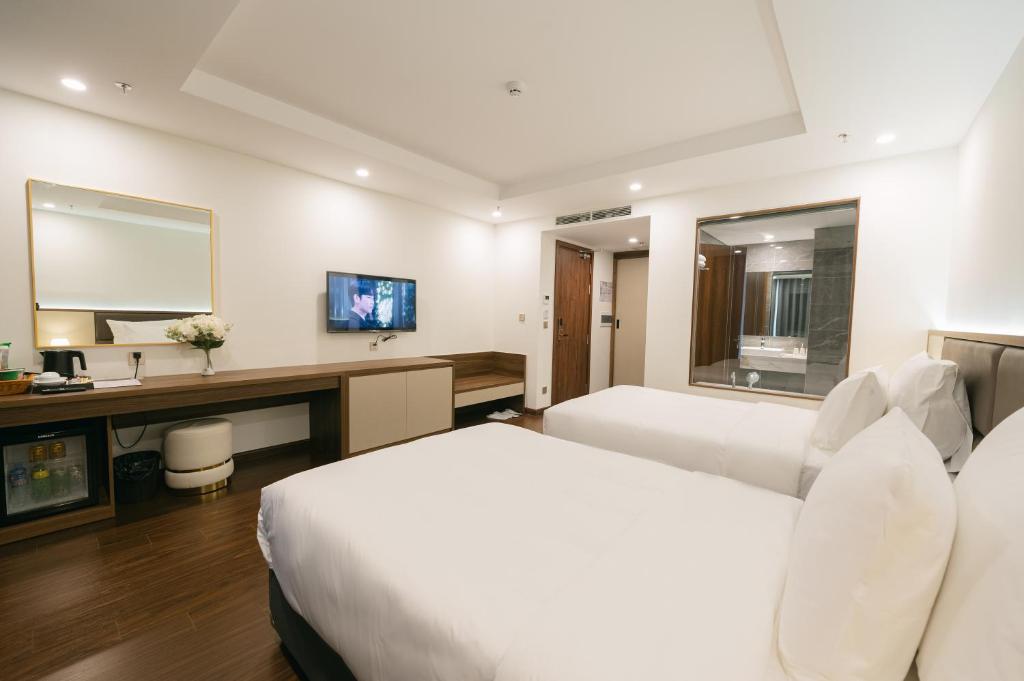 TV a/nebo společenská místnost v ubytování Love St - Hanoi Hotel