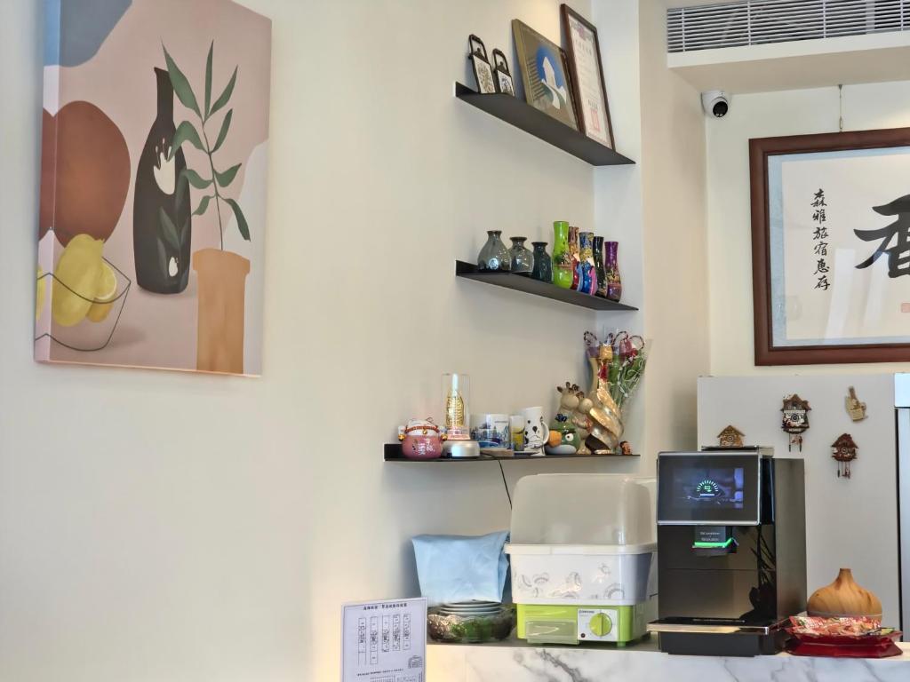 Kuchyň nebo kuchyňský kout v ubytování Senya Hotel