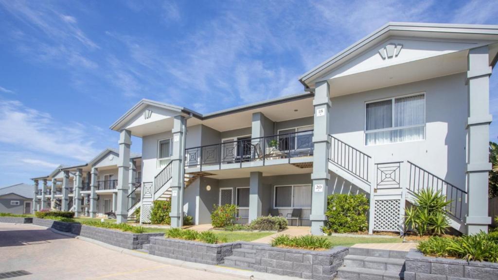 a row of apartment buildings with balconies at Apartment 19 - The Meridian in Old Bar
