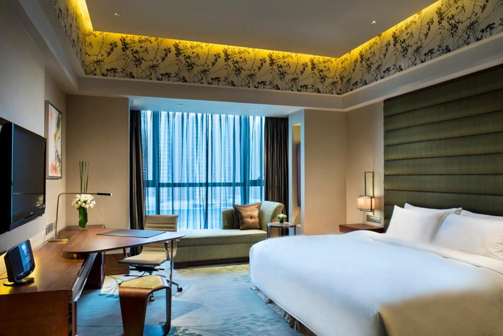 Postel nebo postele na pokoji v ubytování Crowne Plaza Hefei by IHG
