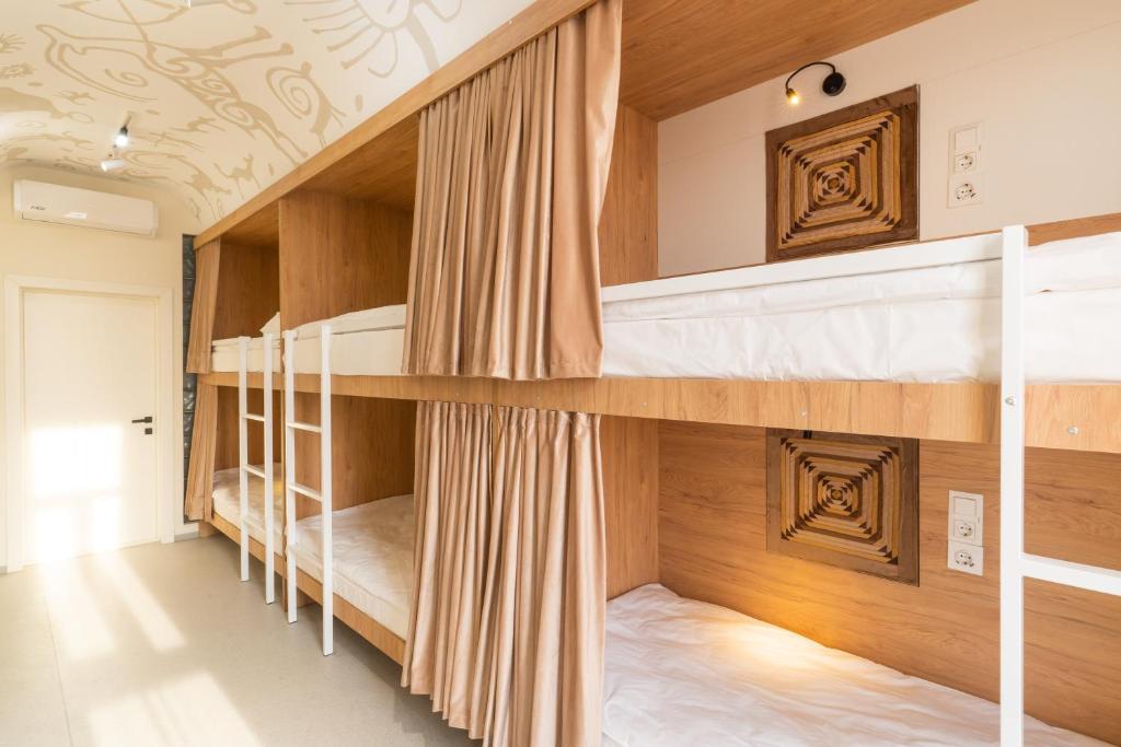 Postel nebo postele na pokoji v ubytování ololoYurt