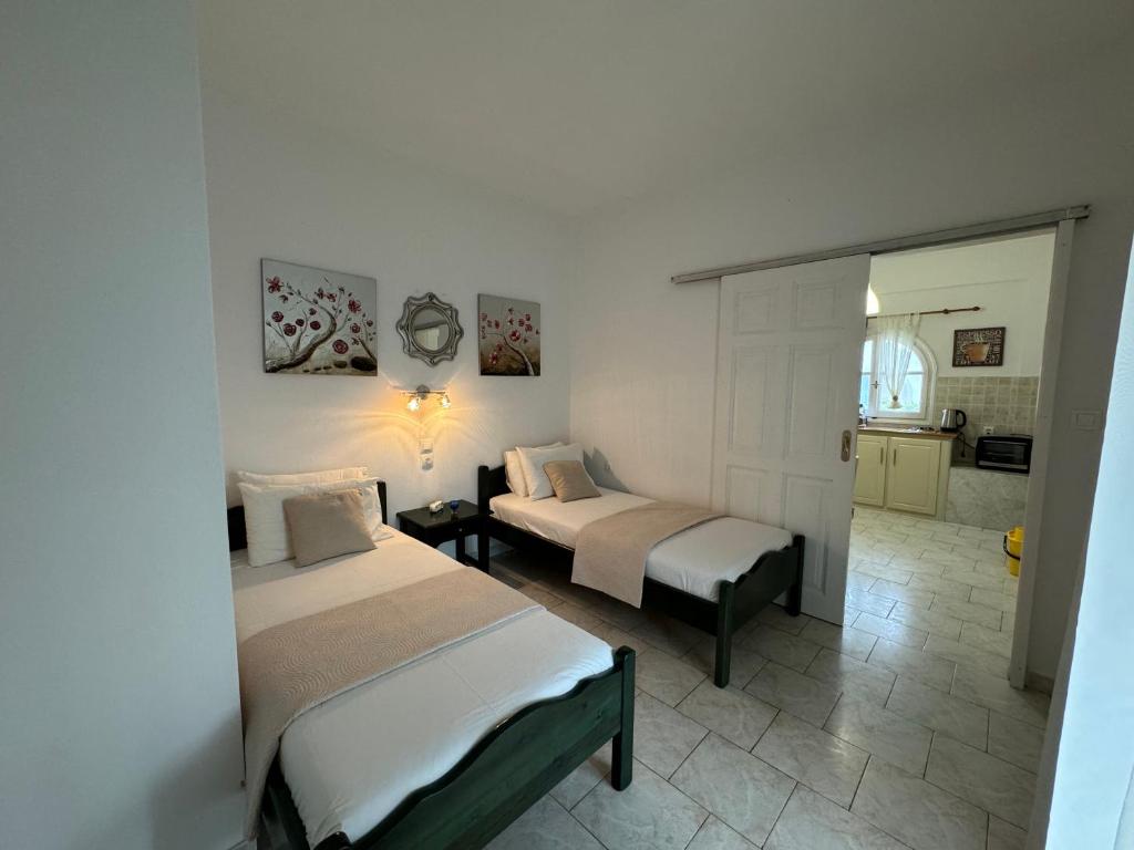 Postel nebo postele na pokoji v ubytování Sungate Villas
