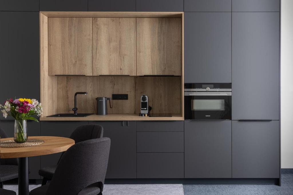 Kuchyň nebo kuchyňský kout v ubytování Apartmány Hangár Strakonice