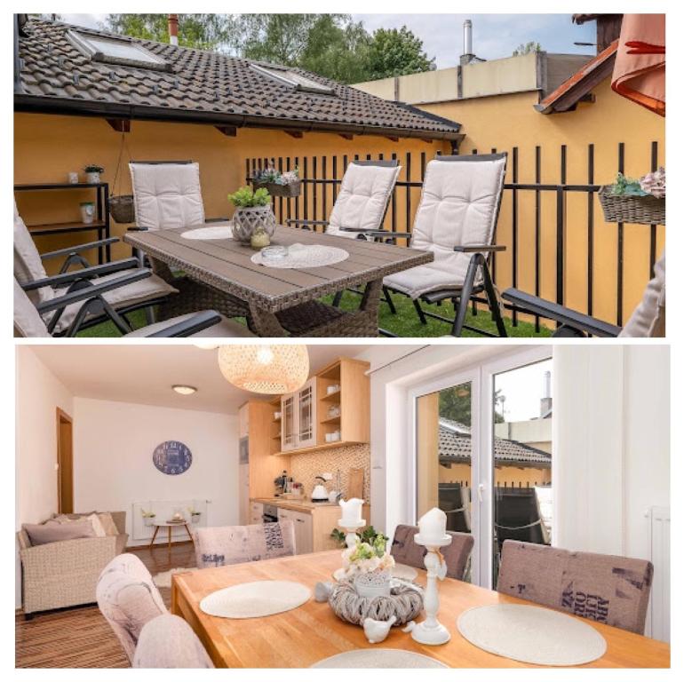 uma cozinha e uma sala de estar com mesa e cadeiras em Dům u lázní Federer em Třeboň
