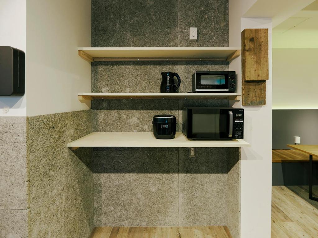 Kuchyň nebo kuchyňský kout v ubytování Akasaka Guesthouse HIVE