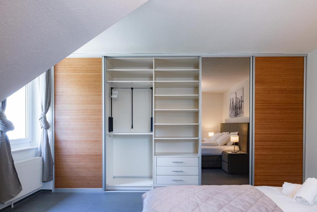Postel nebo postele na pokoji v ubytování EH Apartments Uranus mit privater Sauna