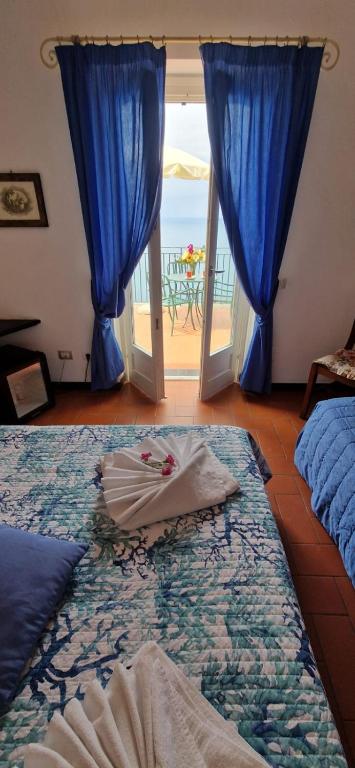 Postel nebo postele na pokoji v ubytování Hotel La Giada del Mesco