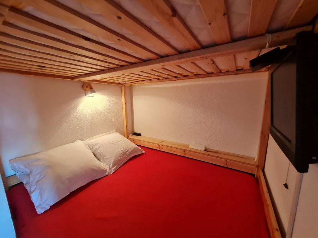 Postel nebo postele na pokoji v ubytování JANREMON - 234 - Studio vue magnifique 4 pers