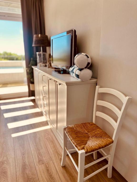 TV a/nebo společenská místnost v ubytování Driftberg 42 Seeluft - Haus A Wohnung 42