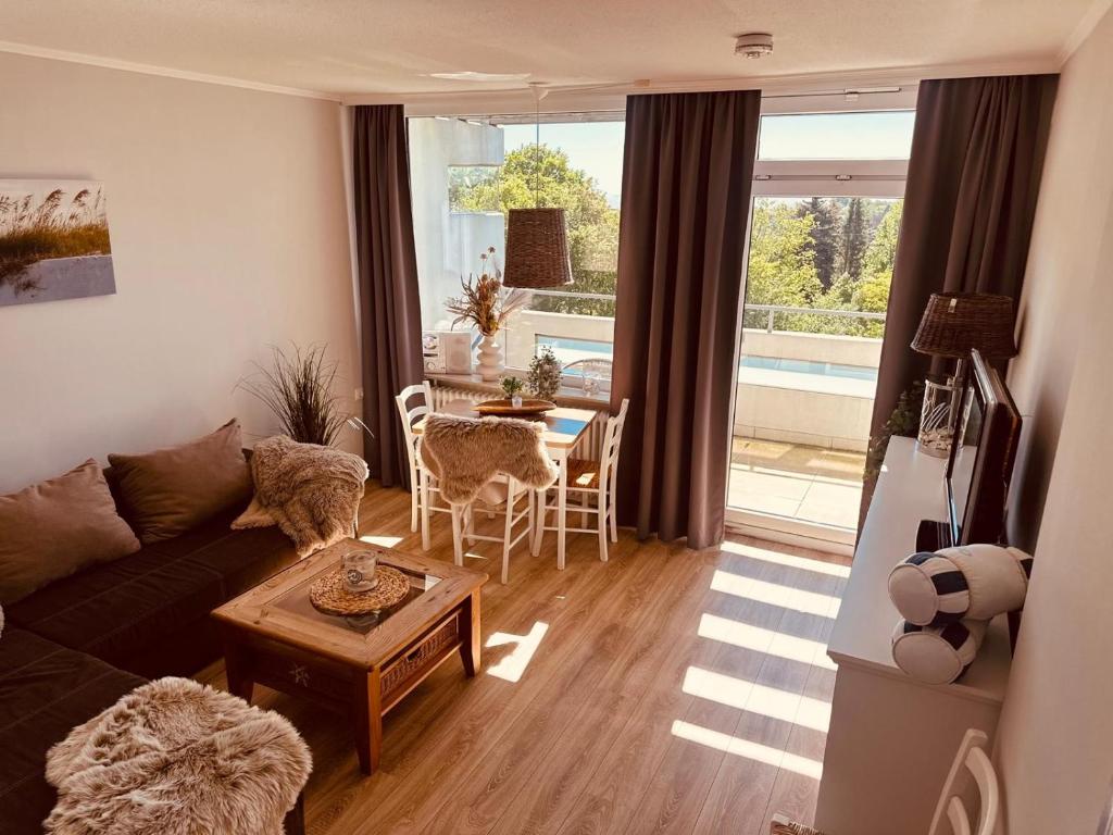 Posezení v ubytování Driftberg 42 Seeluft - Haus A Wohnung 42
