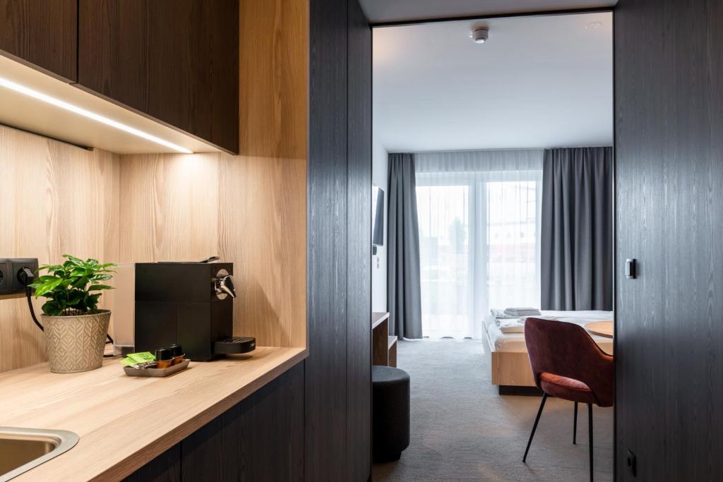Kuchyň nebo kuchyňský kout v ubytování Hotel Novapart stay smart