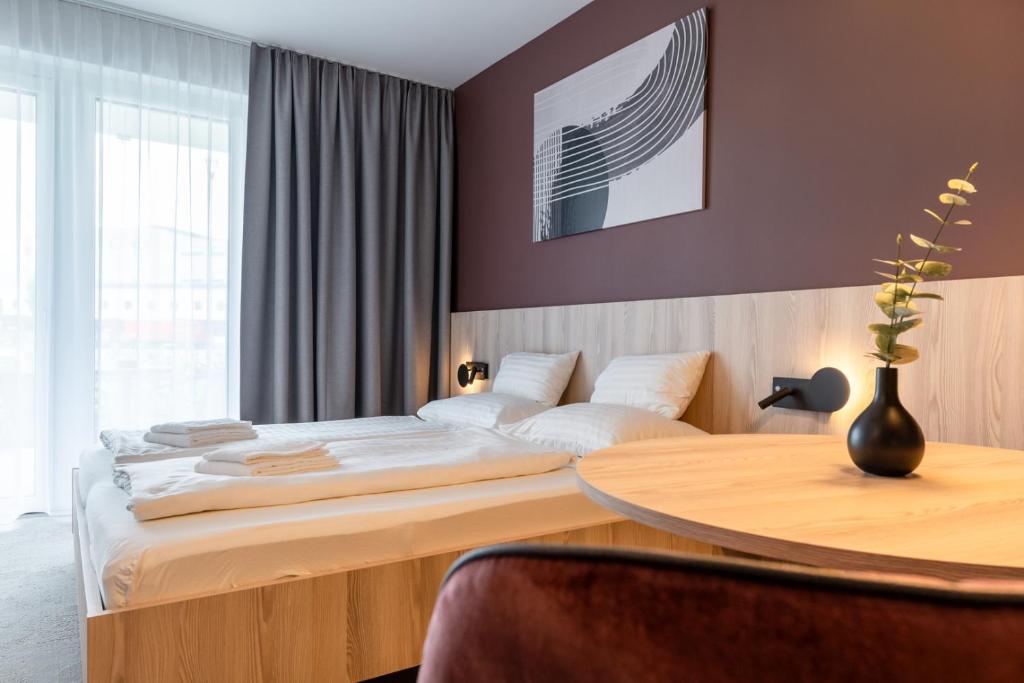 Postel nebo postele na pokoji v ubytování Hotel Novapart stay smart