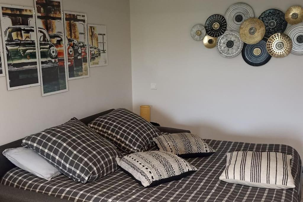 Postel nebo postele na pokoji v ubytování Appartement Logis Hippolyte