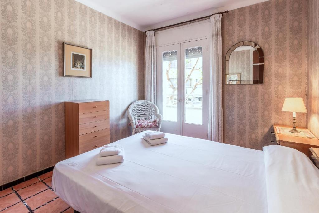 Postel nebo postele na pokoji v ubytování Port Llançà 31 - apartamento con vistas al mar