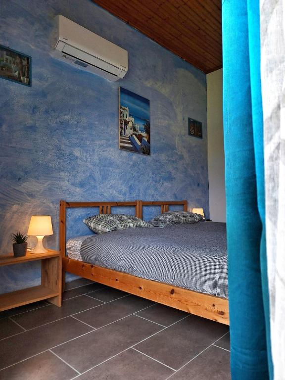 Postel nebo postele na pokoji v ubytování LeMaMi Seafront Bungalows