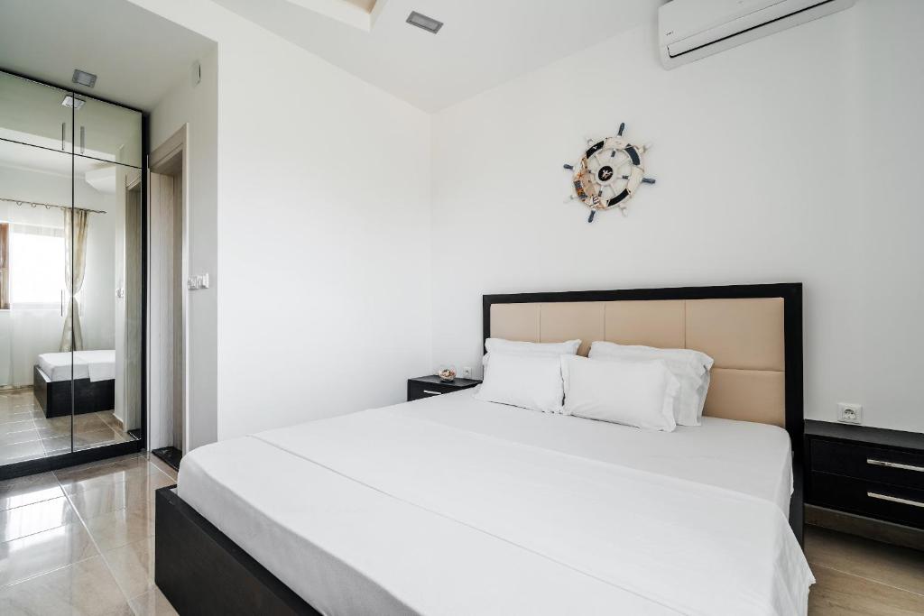 Postel nebo postele na pokoji v ubytování Przno Apartments by In Property