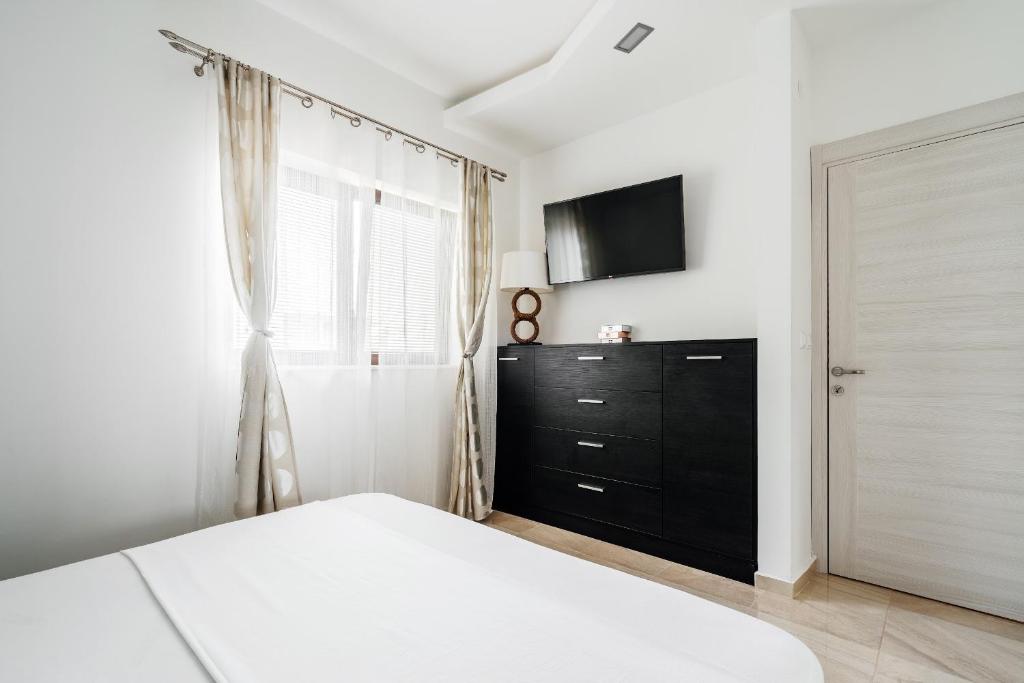 TV a/nebo společenská místnost v ubytování Przno Apartments by In Property