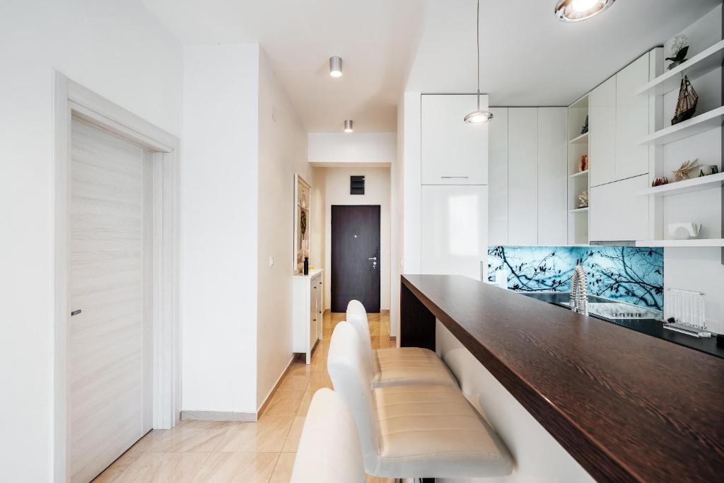 Kuchyň nebo kuchyňský kout v ubytování Przno Apartments by In Property