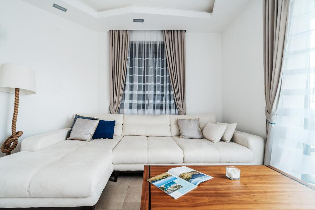 Postel nebo postele na pokoji v ubytování Przno Apartments by In Property