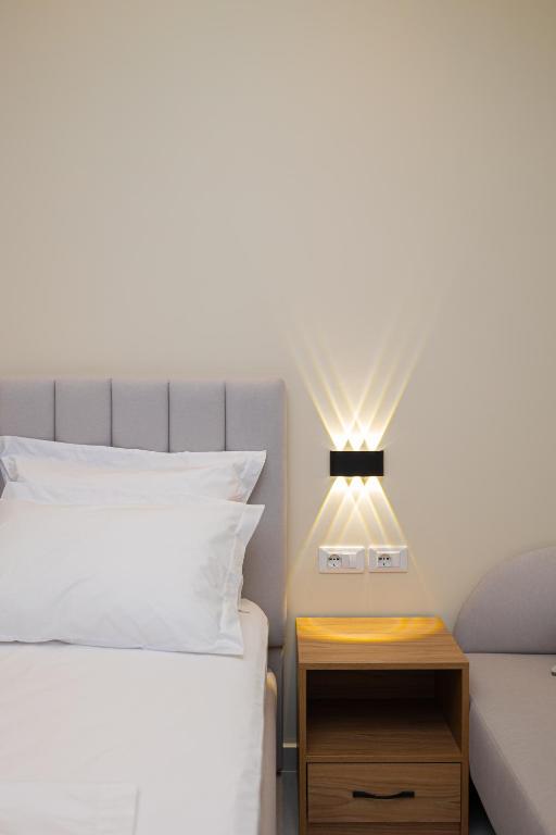 Postel nebo postele na pokoji v ubytování Hotel Aluor