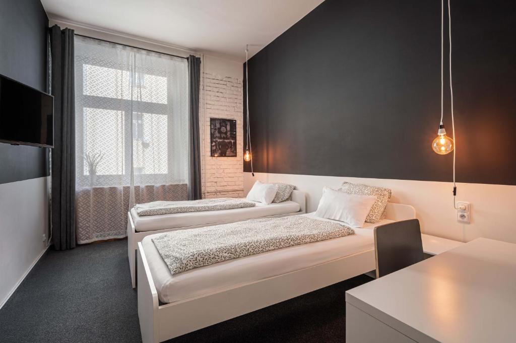 Postel nebo postele na pokoji v ubytování Bohem Prague Hotel
