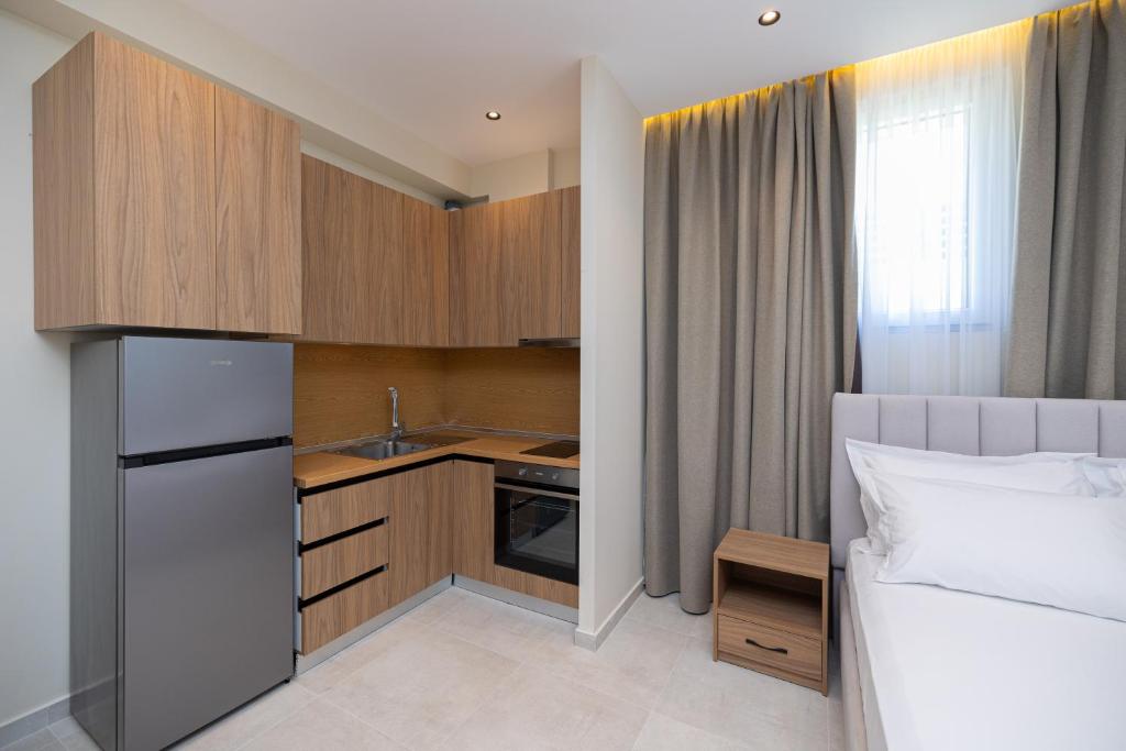 Kuchyň nebo kuchyňský kout v ubytování Hotel Aluor