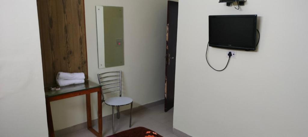 TV a/nebo společenská místnost v ubytování Hotel Shaurya