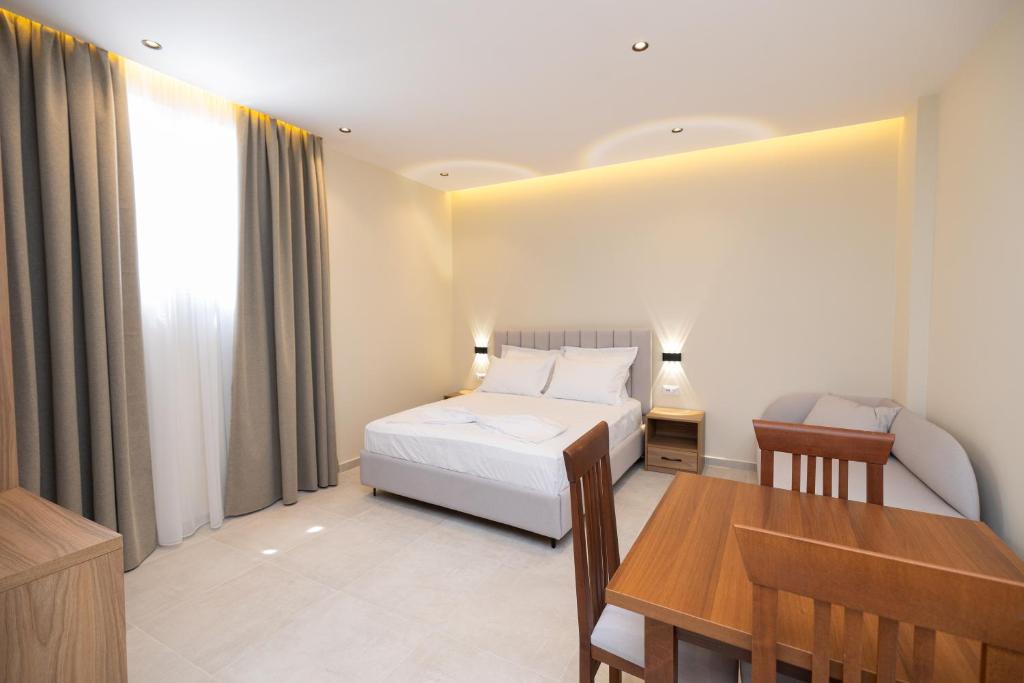 Postel nebo postele na pokoji v ubytování Hotel Aluor