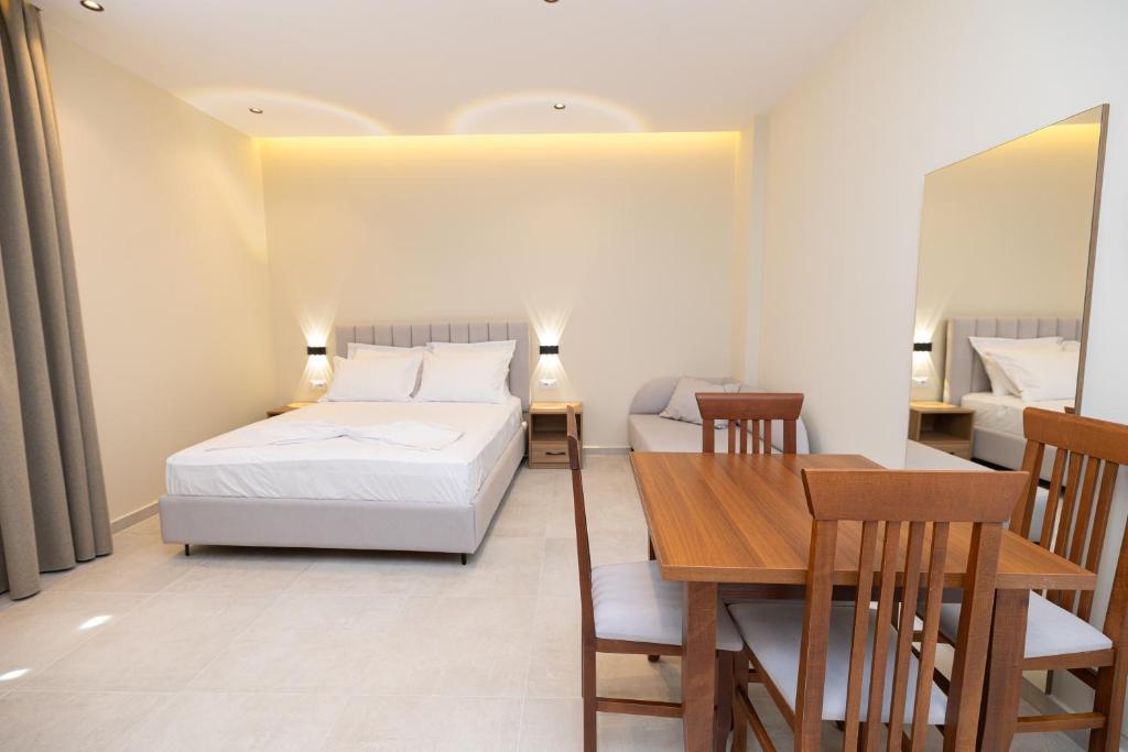 Postel nebo postele na pokoji v ubytování Hotel Aluor