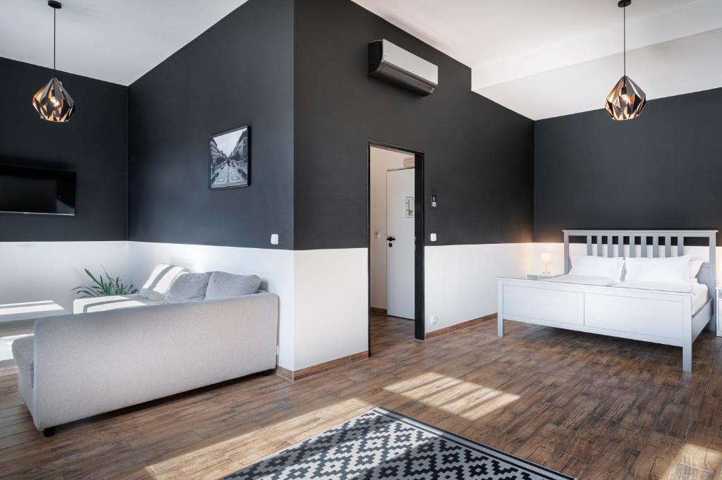 Postel nebo postele na pokoji v ubytování Bohem Prague Hotel