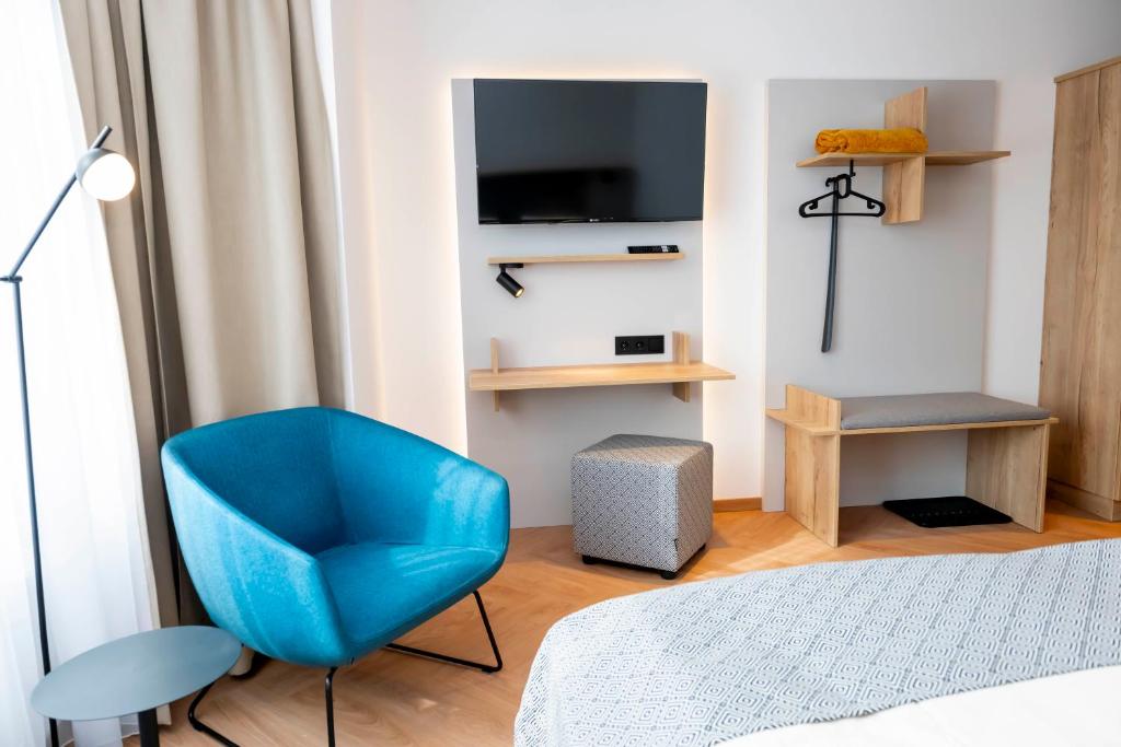 TV a/nebo společenská místnost v ubytování Zum Lenz